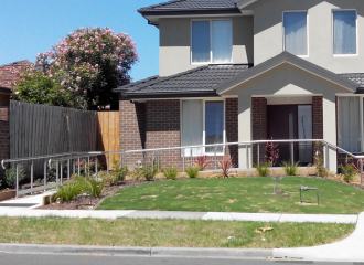 Rooming house with stair and ramp