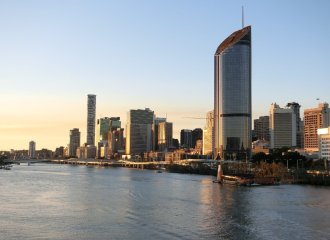 Brisbane city and riser at sunset