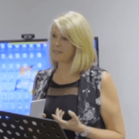 Image of Maxine Parker speaking at a lectern