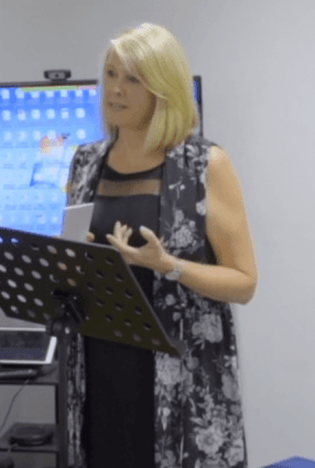 Image of Maxine Parker speaking at a lectern